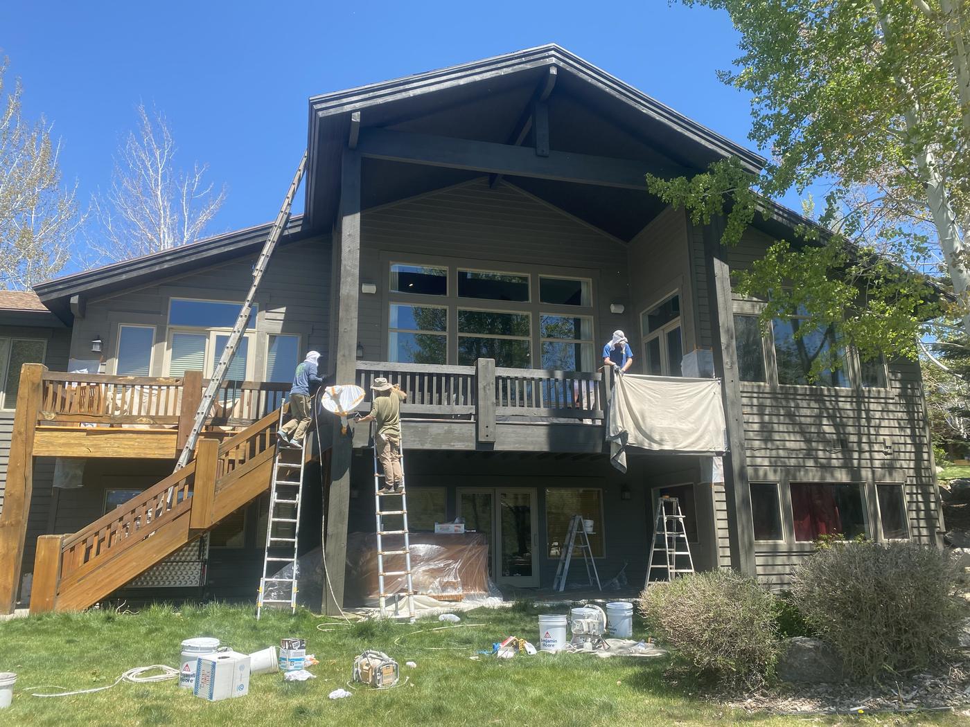 Focus Custom Wallworks crew repainting a large deck and exterior in Park City